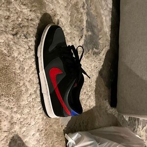 Nike Men's Black and Red Sneakers with Blue Detail